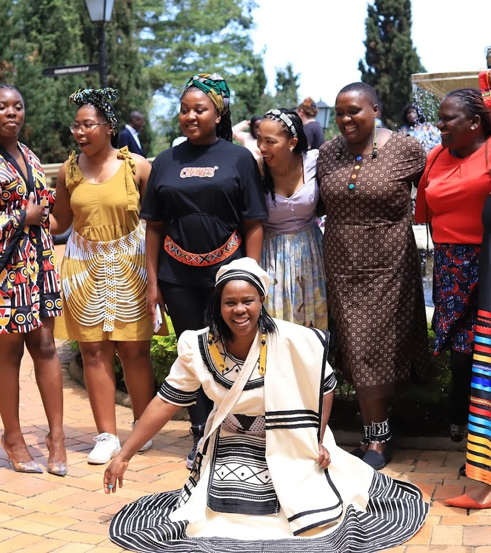 AWPCAB women advocates together in traditional attire