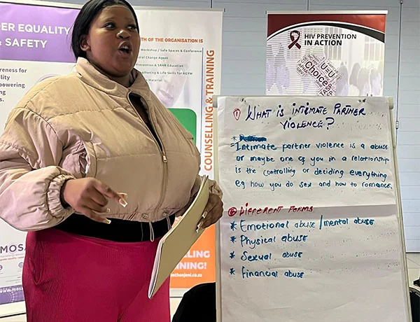 A champion facilitating a session at the Emthonjeni workshop