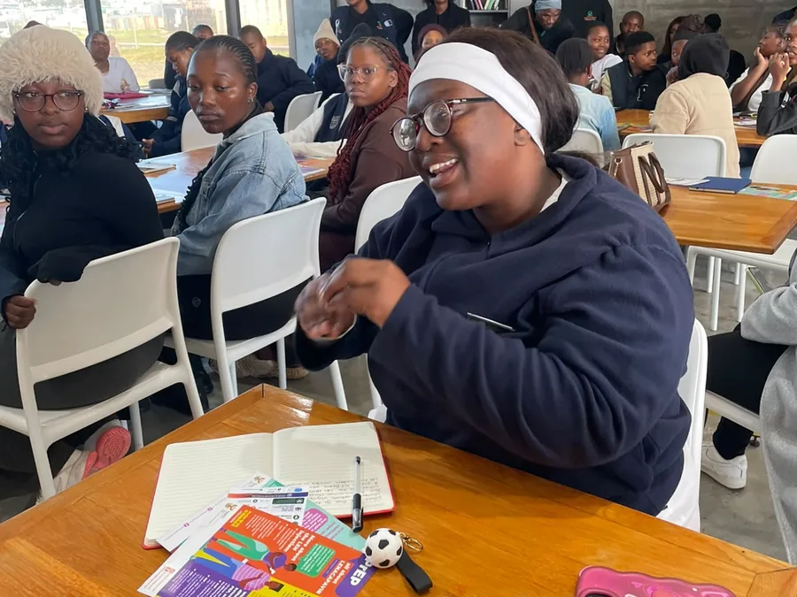 Women learning about HIV prevention options together
