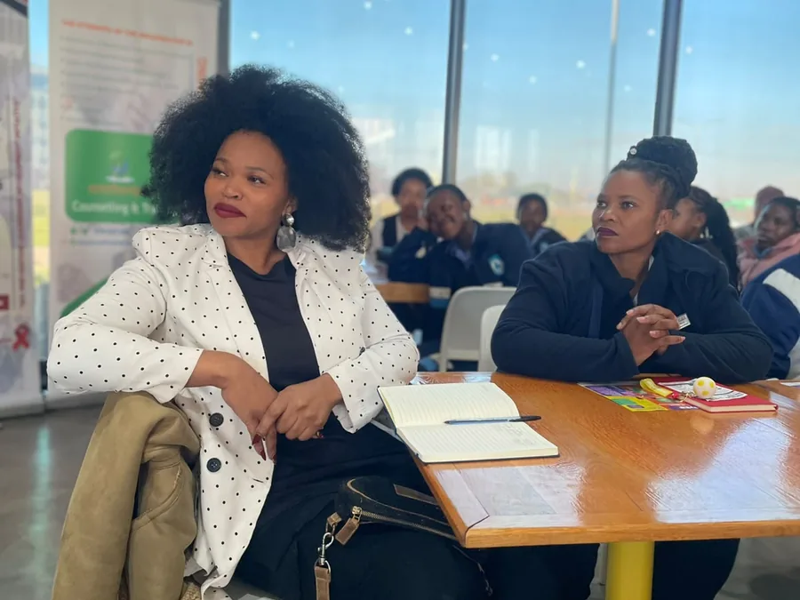Women in discussion at an HIV prevention dialogue