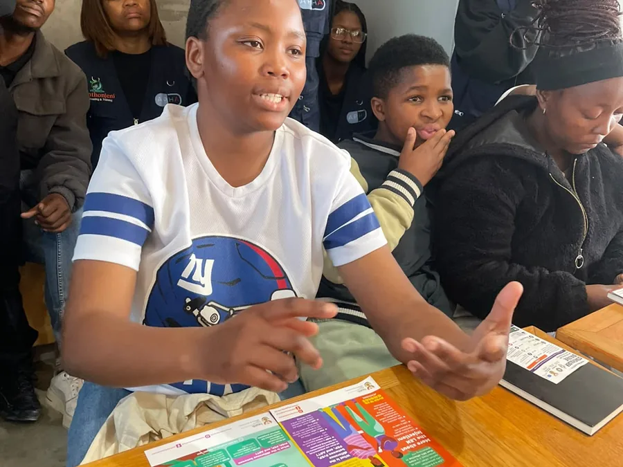 Young people engaging at a community HIV dialogue