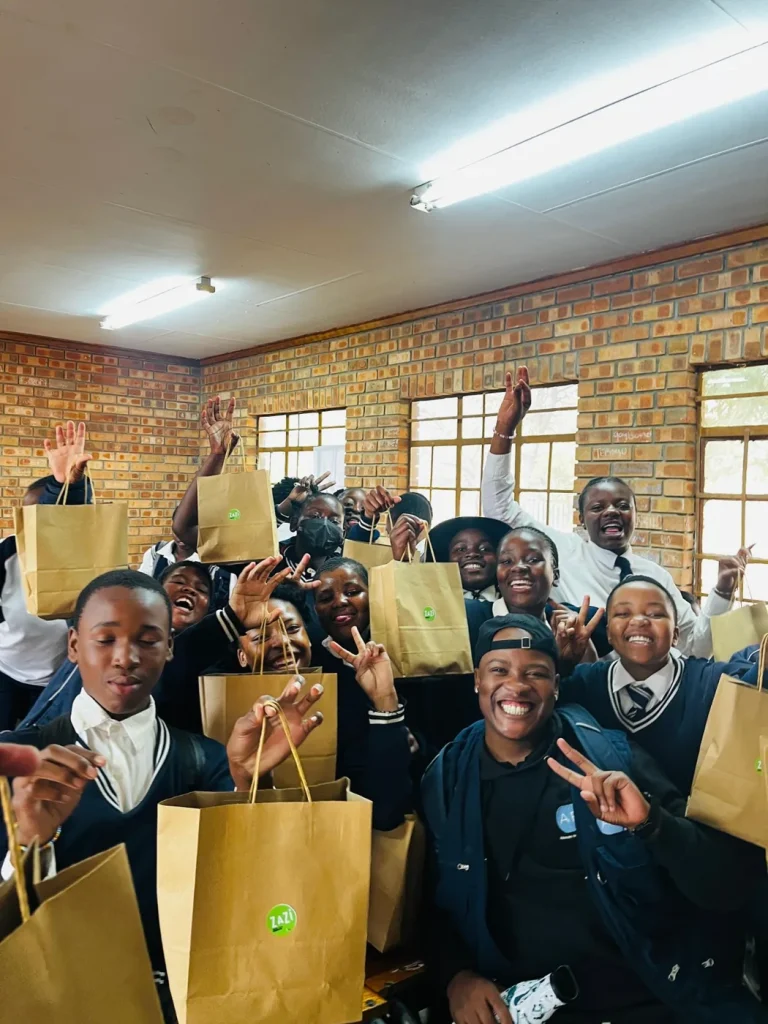 Learners celebrating after a ZAZI Club session