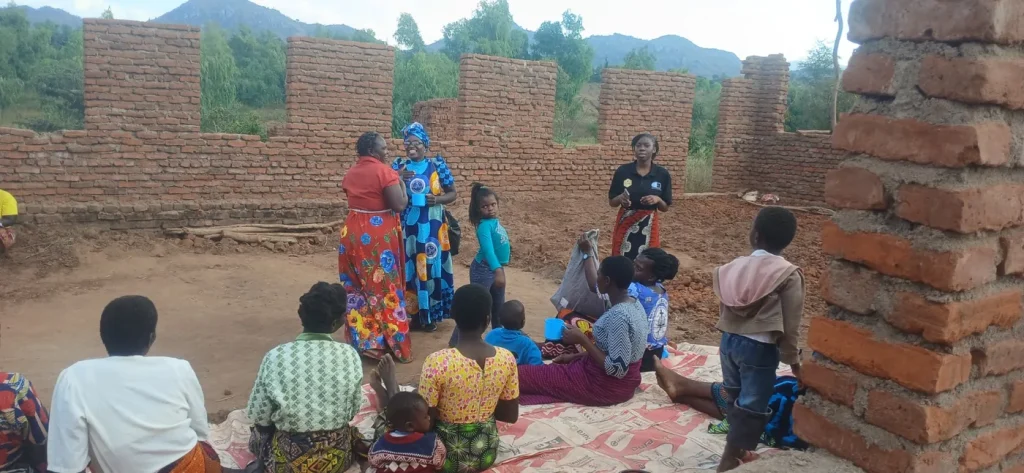Marvelous facilitating a community prevention session in Malawi